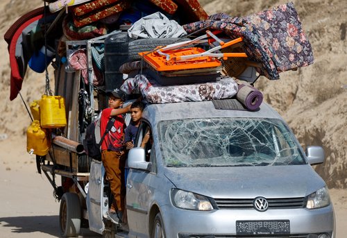 Displaced Palestinians fleeing northern Gaza due to an Israeli military operation,