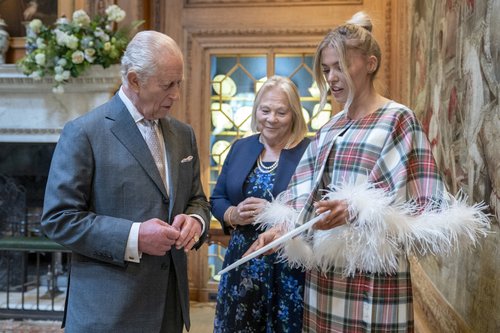 Britain's King Charles meets Siobhan Mackenzie at an event at Dumfries House to celebrate the King's Foundation's '35 under 35' network