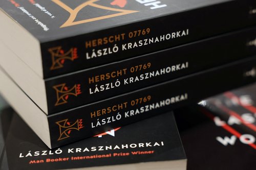 Copies of books written by Hungarian author Laszlo Krasznahorkai, winner of the 2025 Nobel Prize for Literature,