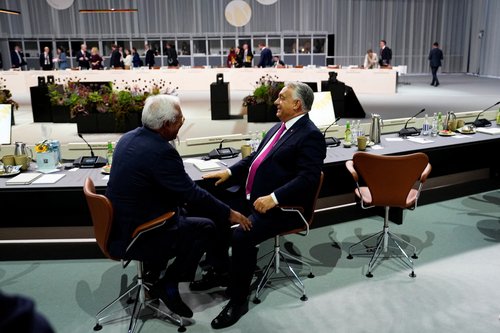 European Council President Antonio Costa and Hungarian Prime Minister Victor Orban share a moment following the conclusion of the plenary session at Bella Center in Copenhagen