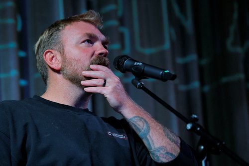 Democratic U.S. Senate candidate Graham Platner listens to a question from the audience at a campaign town hall meeting in Ogunquit, Maine, U.S., October 22, 2025. REUTERS/Brian Snyder