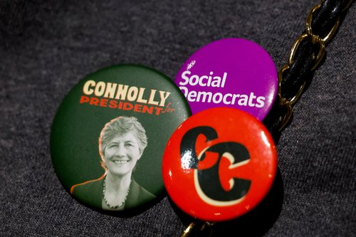Pins in support of Independent Presidential candidate Catherine Connolly and of Social Democrats