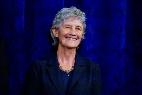 President-elect Catherine Connolly reacts as she stands on a stage at Dublin Castle, on the day of the announcement of the results of the Irish presidential election in Dublin, Ireland, October 25, 2025. REUTERS/Clodagh Kilcoyne