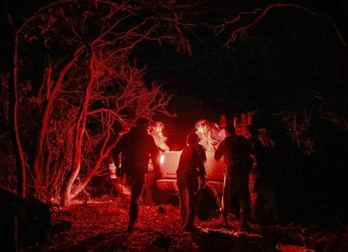Artillerymen of the 152nd Separate Jaeger Brigade get into a car after a combat mission, amid Russia's attack on Ukraine, near the frontline town of Pokrovsk