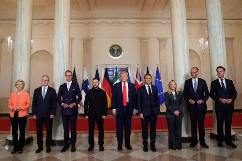 FILE PHOTO: U.S. President Donald Trump, Ukrainian President Volodymyr Zelenskiy, German Chancellor Friedrich Merz