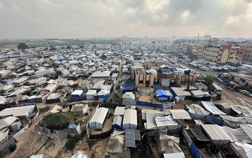 Palestinians take shelter in their tents, during a ceasefire between Israel and Hamas, in Al-Mawasi, Khan Younis, southern Gaza Strip, November 11, 2025.
