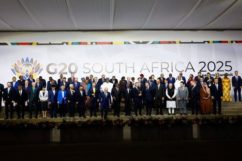 Leaders and delegates attend a family photo event, on the opening day of the G20 Leader's Summit at the Nasrec Expo Centre in Johannesburg, South Africa, November 22, 2025. REUTERS/Thomas Mukoya/Pool
