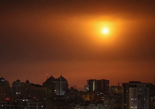 An explosion of a Russian drone in the sky over the city during a Russian missile and drone strike, amid Russia's attack on Ukraine, in Kyiv, Ukraine November 25, 2025. REUTERS/Gleb Garanich