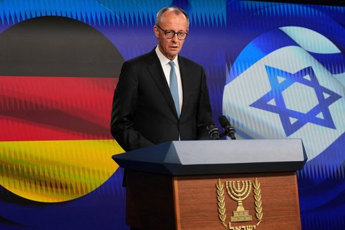 German Chancellor Friedrich Merz addresses the media alongside Israel’s Prime Minister Benjamin Netanyahu (not pictured) during a joint press conference in Jerusalem, Sunday, Dec. 7, 2025. Ariel Schalit/Pool via REUTERS