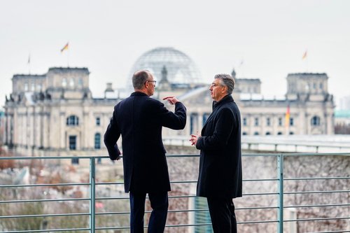 German Chancellor Friedrich Merz speaks with Croatia's Prime Minister Andrej Plenkovic during their meeting at the Chancellery in Berlin, Germany December 10, 2025. Markus Schreiber/Pool via REUTERS