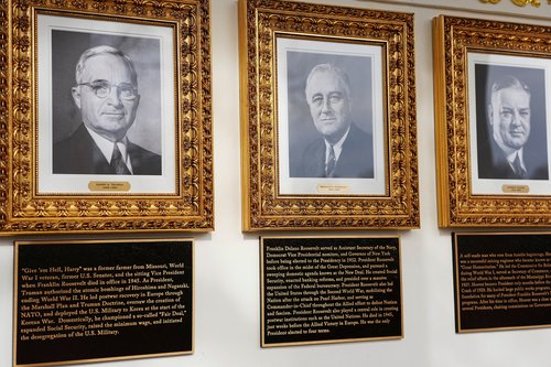 Portraits and plaques dedicated to former U.S. Presidents Harry S. Truman, Franklin D. Roosevelt and Herbert Hoover at the "Presidential Walk of Fame" at the White House, in Washington, D.C., U.S., December 17, 2025. REUTERS/Aaron Schwartz