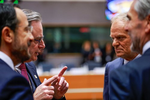 Belgium's Prime Minister Bart De Wever speaks with Poland's Prime Minister Donald Tusk as they attend a European Union leaders' summit in Brussels, Belgium, December 18, 2025. REUTERS/Stephanie Lecocq