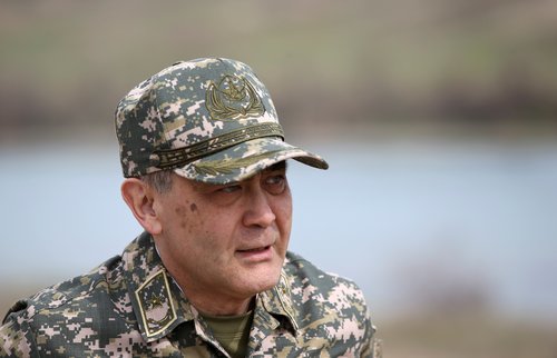 FILE PHOTO: Kazakh Defence Minister Yermekbayev attends military exercises held by assault troops in Almaty Region