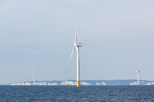 FILE PHOTO: Power-generating windmill turbines are seen at an offshore wind farm in the Baltic Sea