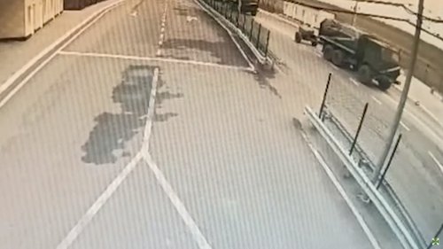 Video screengrab shows military vehicles crossing into Ukraine's Kherson Oblast from Crimea