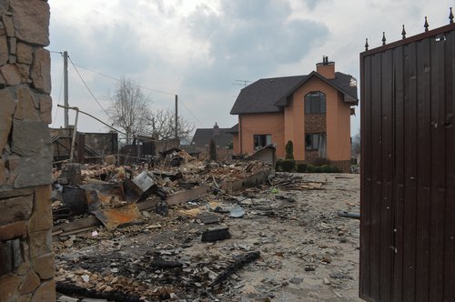 A view shows a residential area damaged by shelling in the village of Hostomel