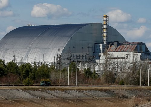 General view of the New Safe Confinement structure over the old sarcophagus covering the damaged fourth reactor at the Chernobyl Nuclear Power Plant, in Chernobyl