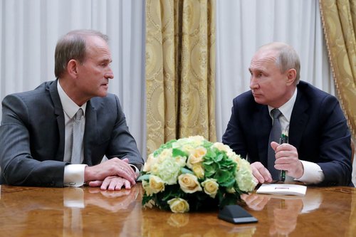 viktor medvedčuk, vladimir putin, FILE PHOTO: Russia's President Putin meets leader of Ukraine’s Opposition Platform - For Life party Medvedchuk in Saint Petersburg