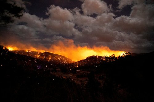 FILE PHOTO: The McBride Fire burns in the heart of the village in Ruidoso