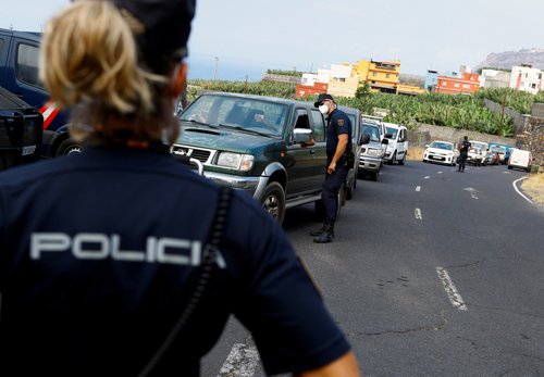 FILE PHOTO: A female police office on duty on the Spanish Canary Island of La Palma