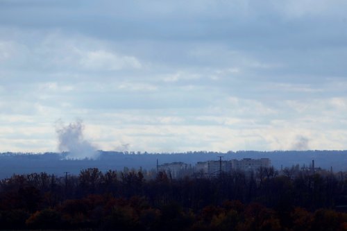 An explosion from a rocket is seen, in Bakhmut