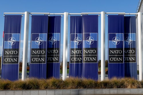 A view shows banners outside NATO headquarters in Brussels