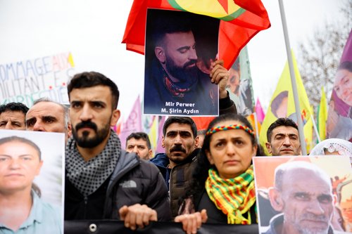 Members of the Kurdish community gather at Place de la Republique square following the shooting, in Paris