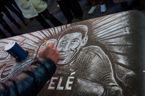 People mourn the death of Brazilian soccer legend Pele, in New York