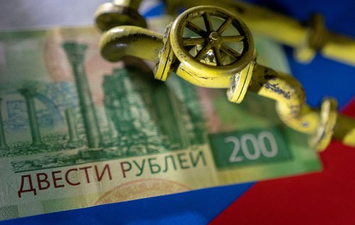 FILE PHOTO: Illustration shows natural gas pipeline, Russian Rouble banknote and flag