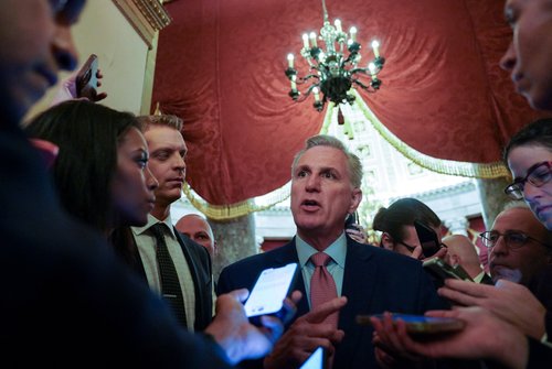 U.S. Representatives gather for the vote for new House Speaker on the first day of the new Congress at the U.S. Capitol in Washington