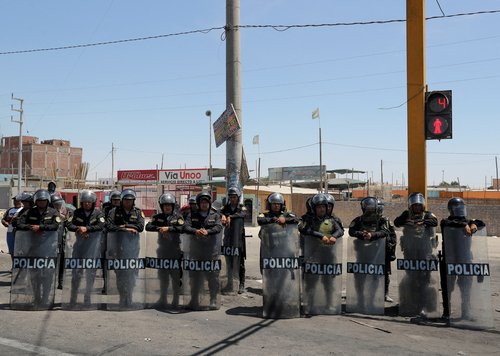 Demonstrators demand early elections and the release of ousted Peruvian leader Pedro Castillo, in Ica