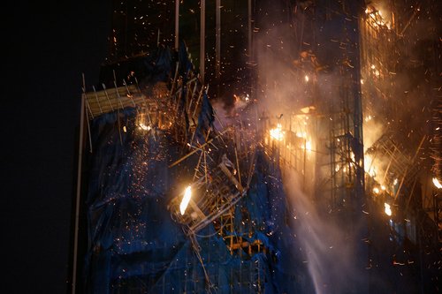 A building is seen on fire in Hong Kong