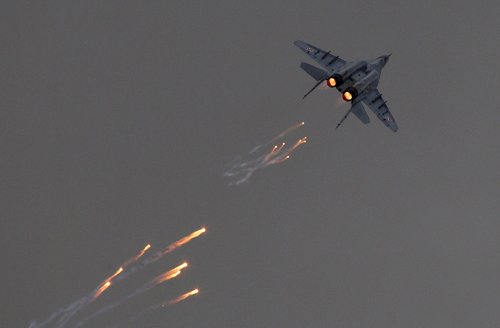 FILE PHOTO: A Polish Air Force MiG-29 aircraft fires flares during a performance at the Radom Air Show at an airport in Radom