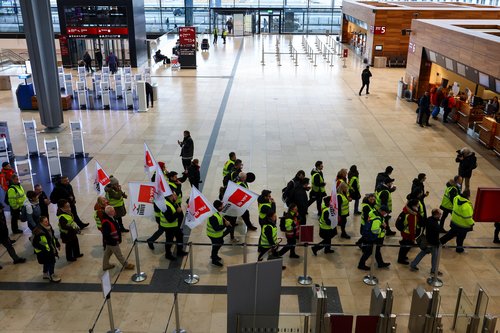 Airport workers protest at BER airport during a strike called by German trade union Verdi, in Berlin