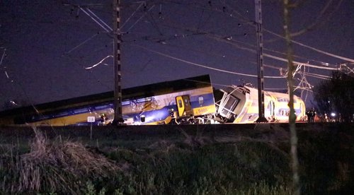 A general view shows aftermath following the derailment of a passenger train after it hit construction equipment on the track, in Voorschoten