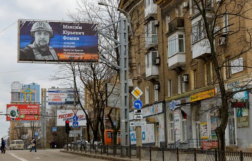 A view shows a poster placed in memory of Russian military blogger Vladlen Tatarsky in Donetsk