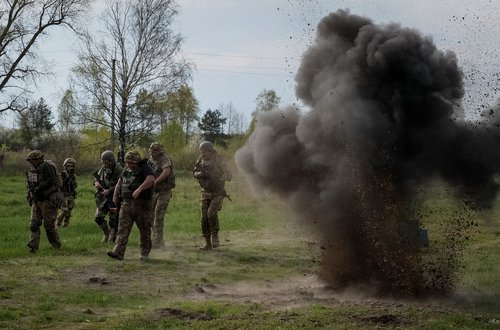 Ukrainian servicemen from the 115 Territorial Defence brigade attend an exercise near the border with Belarus in Zhytomyr region