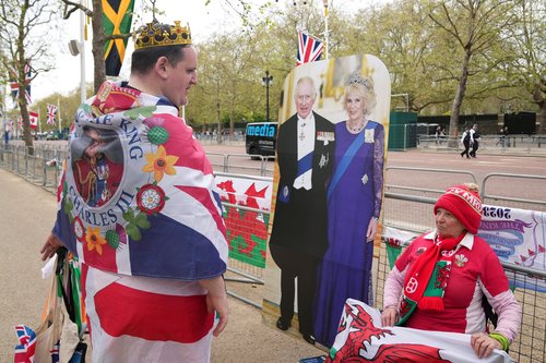 Fans and security in central London ahead of Britain's King Charles Coronation