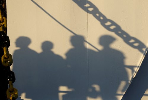 FILE PHOTO: Migrants in Lampedusa