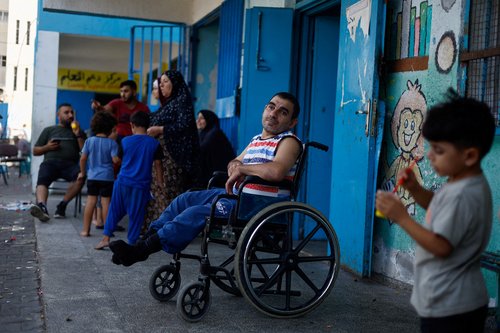 Palestinians shelter in a UN-run school, in Gaza City