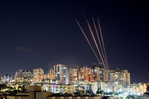 A view shows rockets being launched from the Gaza Strip towards central Israel, as seen from Ashkelon in southern Israel