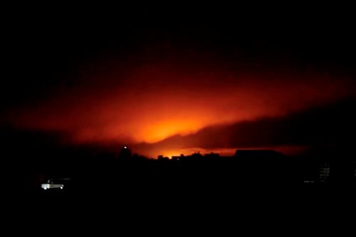 Smoke and flames rise as Israeli air strikes bombard Gaza as seen from Gaza City in this still picture taken from a video