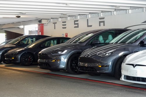 Tesla vehicles shown near retail store in California