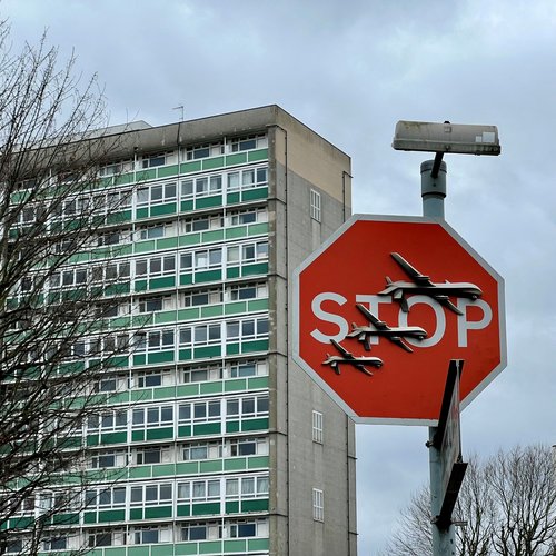 Banksy artwork showing drones on stop sign stolen in London