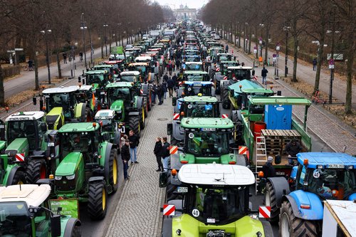 FILE PHOTO: German farmers protest with tractors against the planned cut of vehicle tax subsidies in Berlin