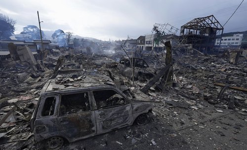 Burnt down residential and commercial area site following an earthquake is seen in Wajima