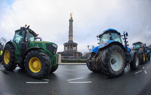 German farmers protest against the cut of vehicle tax subsidies in Berlin