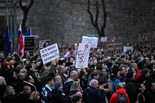 Demonstrators attend a protest against the government's proposal to cancel a branch of prosecution, in Bratislava