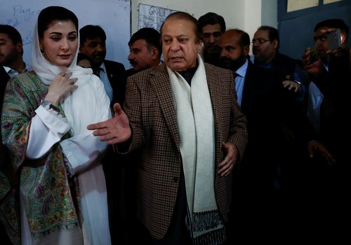 Former Prime Minister Nawaz Sharif votes during the general election in Lahore
