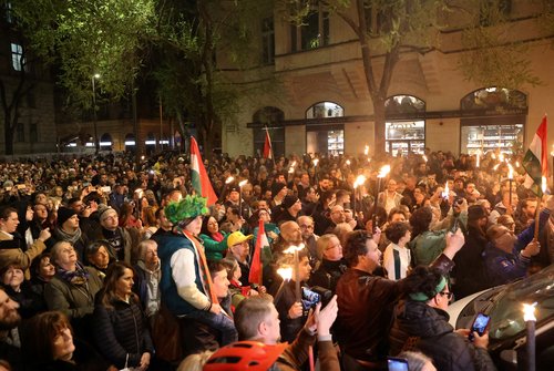 People attend a protest demanding the chief prosecutor Polt and Prime Minister Orban to resign, in Budapest